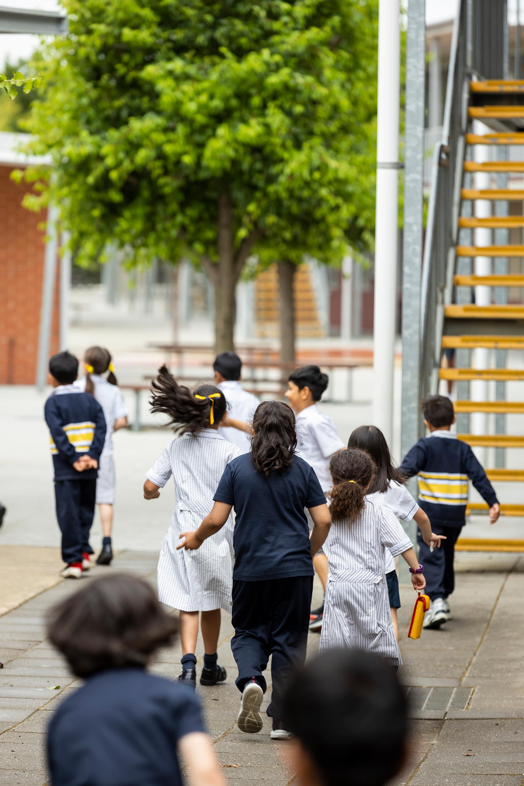 Primary school group of students walking together