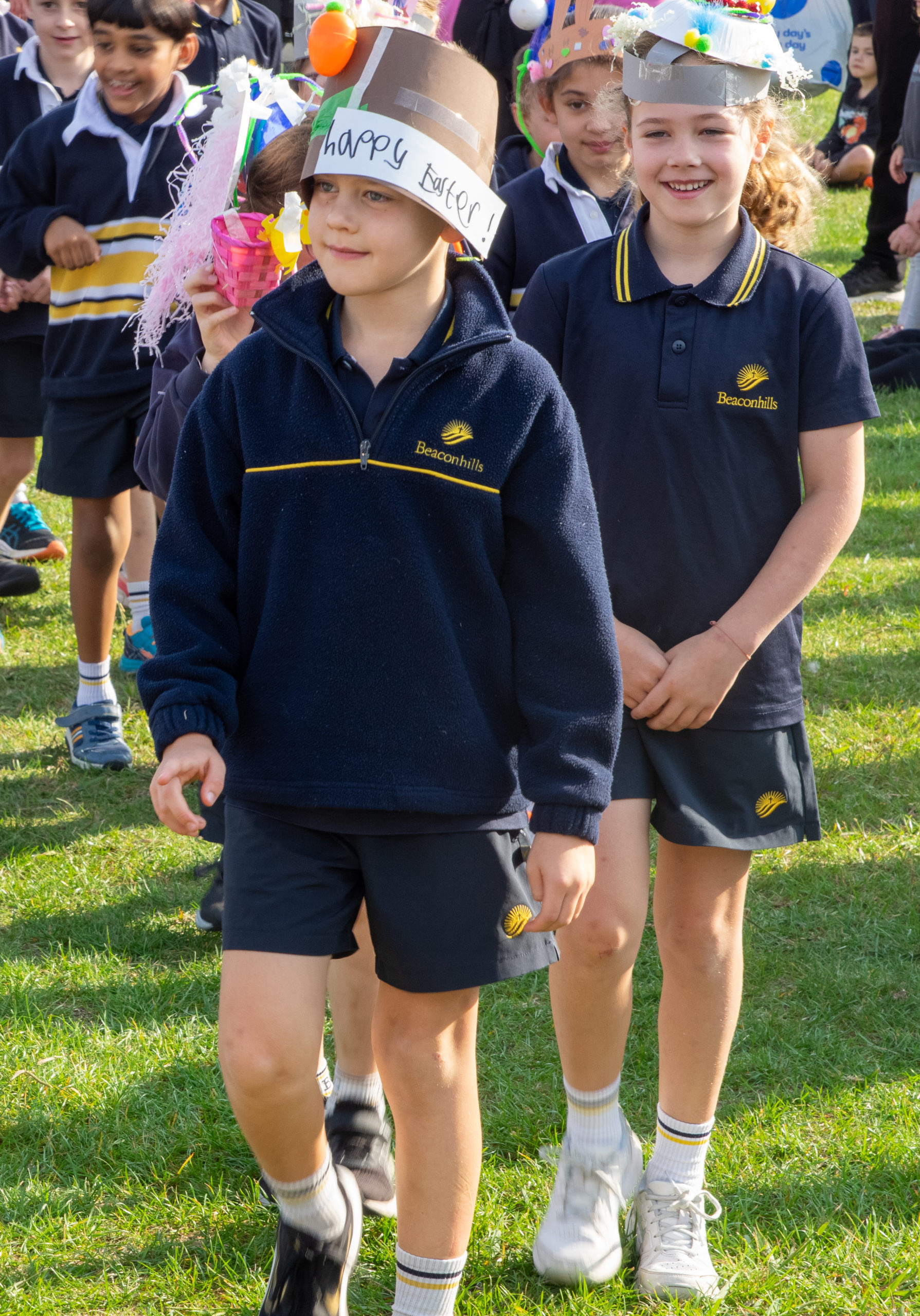 Beaconhills Pakenham students parading with their Easter hats.