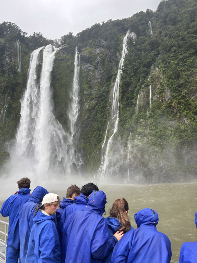Students looking at waterfall