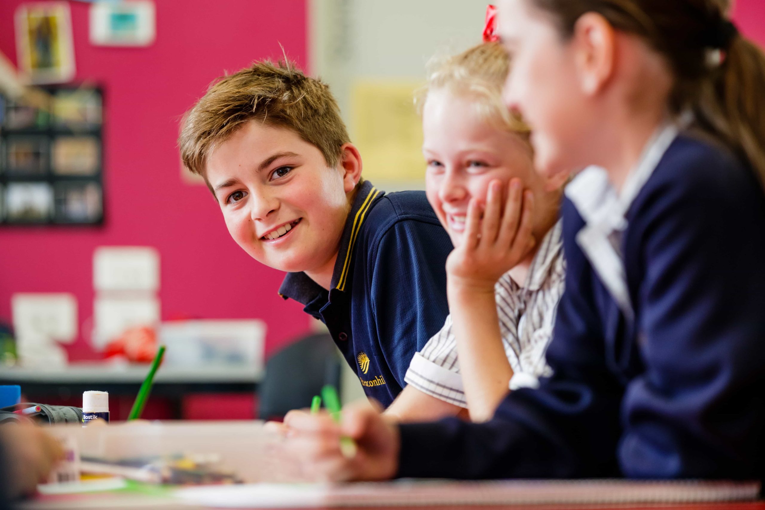 Three Beaconhills students in class
