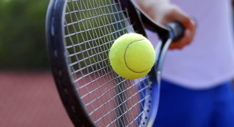 Tennis racket and ball