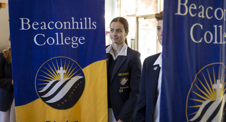 Senior school students with flags