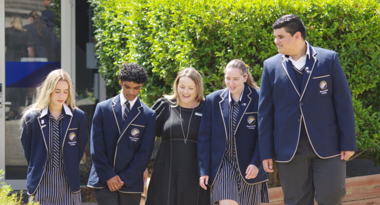 Beaconhills College students walking with staff.
